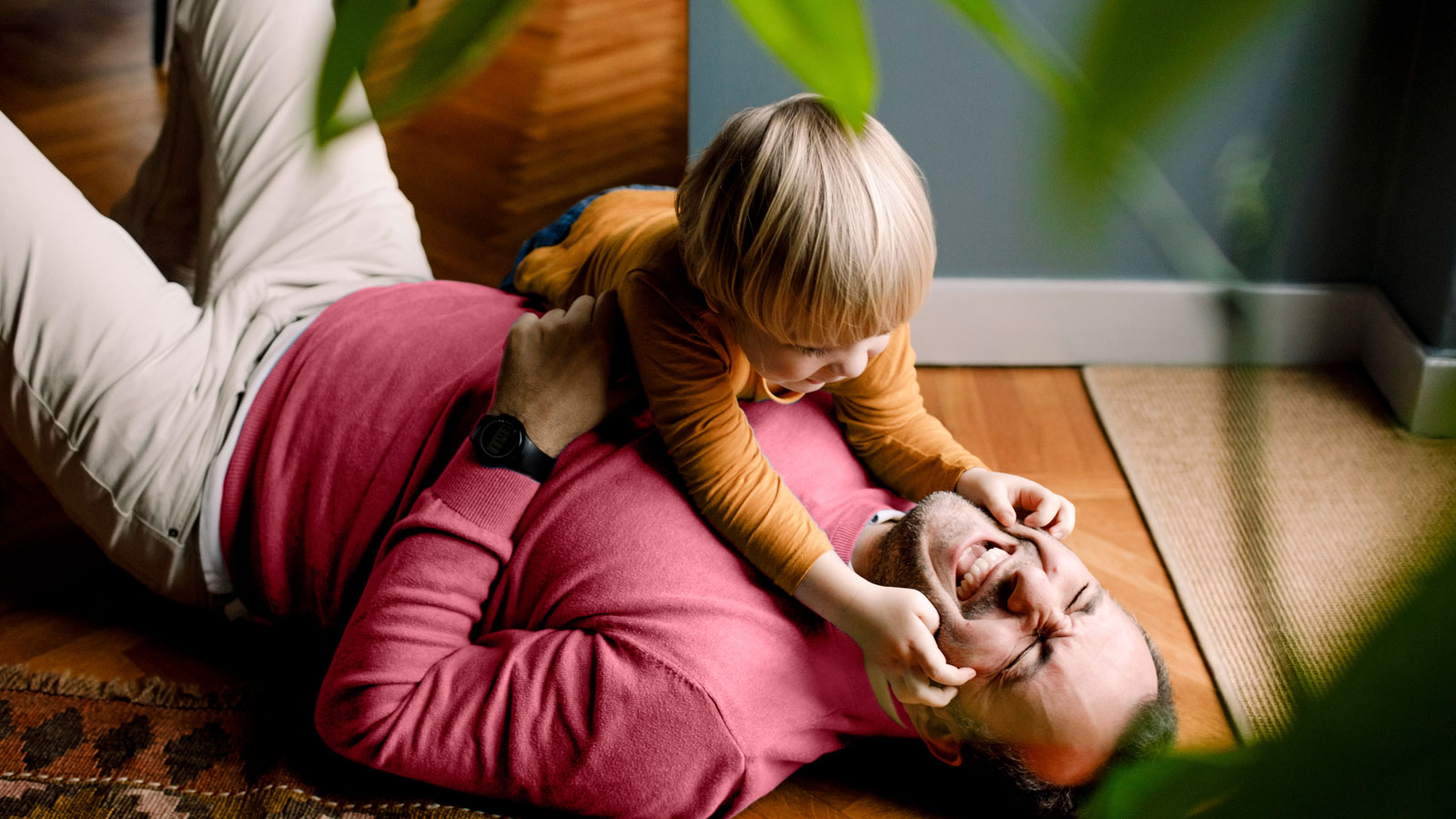 father child playing